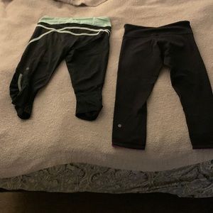 2 pairs of lulu lemon leggings one short one reversible.